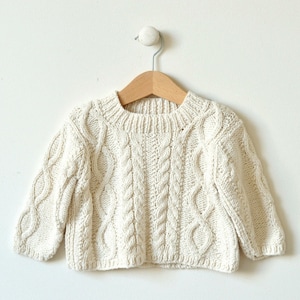 0-4m -4-8m baby sweater knitting pattern - Diamond Cable Crew