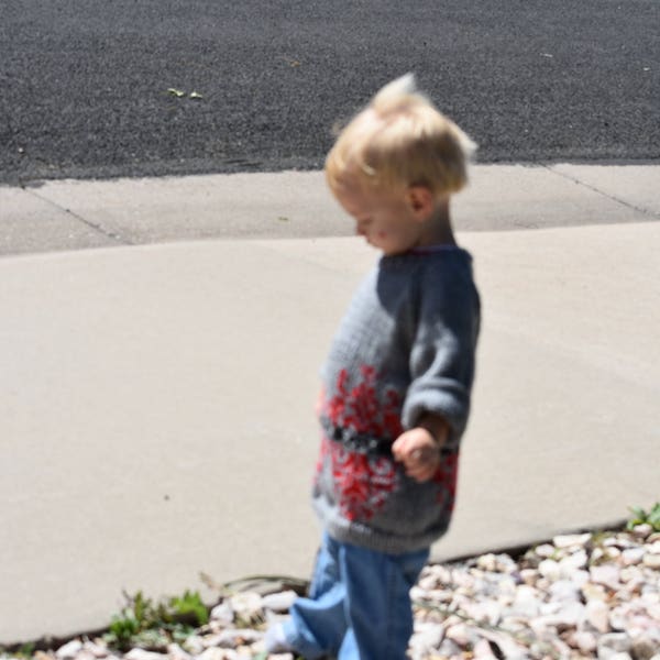 Sweater Child handknit  fits 24 inch chest, raglan style, gray, red, and black. stranded color work design.