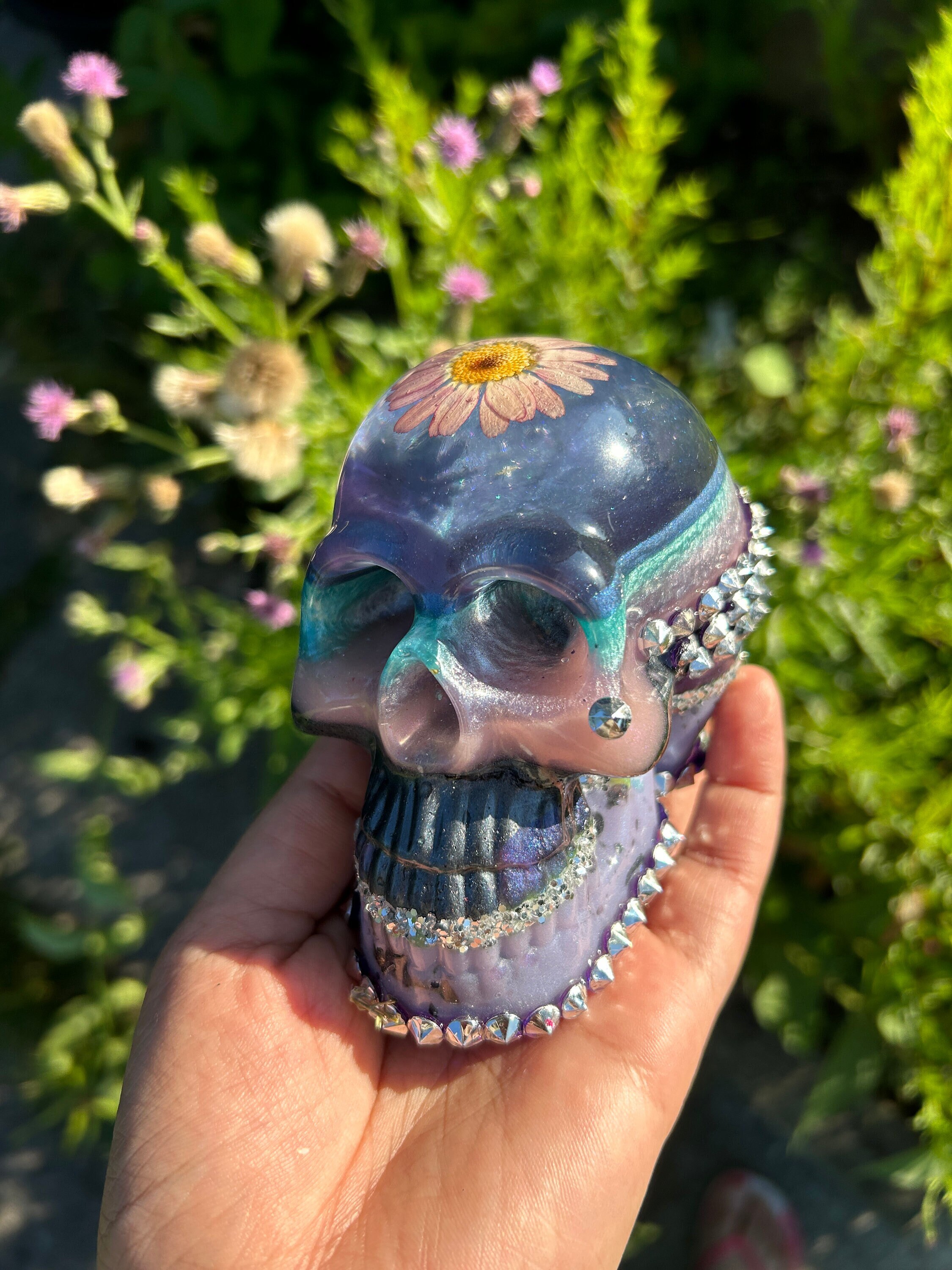 Artisanal Skull head Decor with Dried Flowers preserved in Resin 