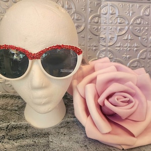 Glam, rhinestone adorned, upscaled sunglasses