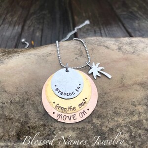 Hand Stamped Stainless Steel, Bronze and Copper Breathe In, Breathe Out, Move On necklace Jimmy Buffett round w/palm tree