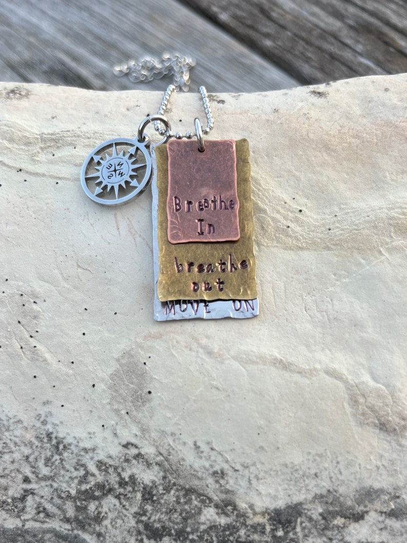 Hand Stamped Stainless Steel, Bronze and Copper Breathe In, Breathe Out, Move On necklace Jimmy Buffett rectangle w/compass