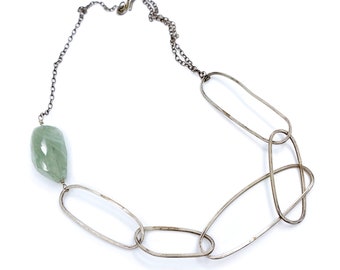 Statement necklace. Faceted aquamarine gemstone with handmade, handformed sterling silver links