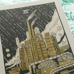 The Devil Tarot Card, showing a liquefied natural gas factory spewing pollution into the air.