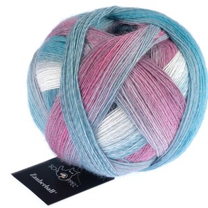 May include: A ball of yarn in shades of blue, pink, and white. The yarn is wrapped in a ball shape and has a label that says "Zauberball" and "Schachenmayr".