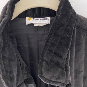 May include: Black velvet jacket with a blue lining and a label that reads "Two Potato of Laguna Beach, Calif."