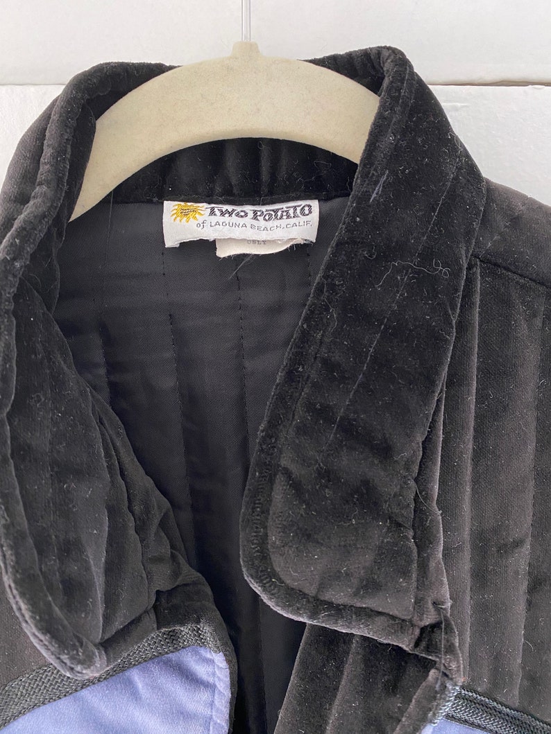 May include: Black velvet jacket with a blue lining and a label that reads "Two Potato of Laguna Beach, Calif."