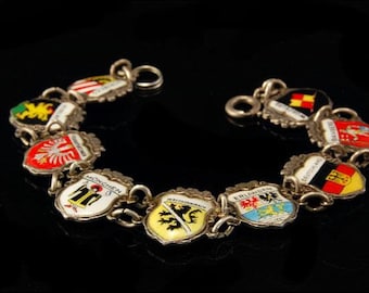 Bracelet à breloques bouclier souvenir de voyage en argent allemand vintage 9 reu 800
