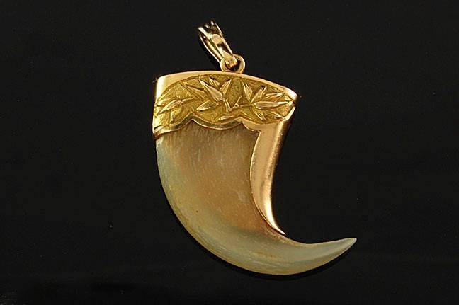 Antique tiger deals claw pendant