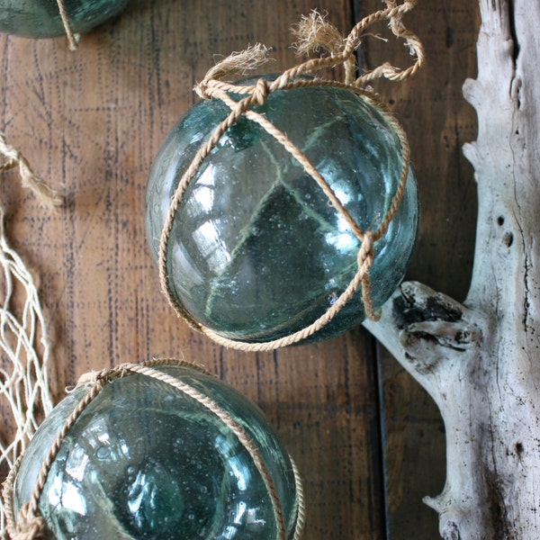 4" Glass Fishing Floats with Nets from Japan Pale Blue Green Glass Handblown PRICE FOR ONE