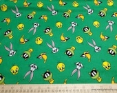 Character Flannel Fabric - Looney Tunes Tossed Faces on Green - By the yard - 100% Cotton Flannel