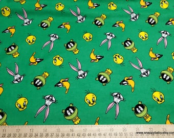 Character Flannel Fabric - Looney Tunes Tossed Faces on Green - By the yard - 100% Cotton Flannel