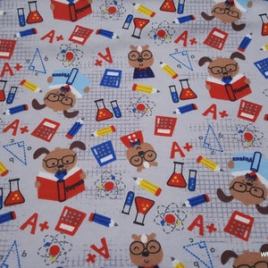 May include: Gray fabric with a repeating pattern of cartoon dogs wearing glasses and holding books, pencils, calculators, beakers, and other school supplies. The background is a gray grid pattern with the words "A+" and "Physics" repeated throughout.