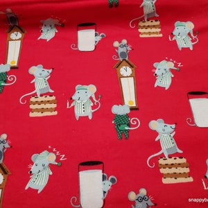 May include: Red fabric with a repeating pattern of mice wearing pajamas, holding glasses of milk, and standing on stacks of cookies. Some mice are sleeping and others are standing near clocks.