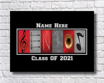 May include: A rectangular wall art print featuring the text Name Here and Class of 2021. The word GENIUS is spelled out using musical instruments and symbols, including a treble clef, clarinets, flutes, a trombone, a brass bell, and a note.