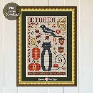 May include: Cross-stitch pattern in a gold frame featuring a black cat, raven, pumpkins, and the word "OCTOBER". The design includes fall leaves, acorns, and decorative elements, perfect for autumn decor.