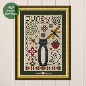 May include: Cross-stitch pattern in a gold frame featuring a black cat, dragonflies, and a strawberry. The word "JUNE" is stitched at the top. The design includes floral and geometric elements, with the text "PDF Instant Download" in a green circle.