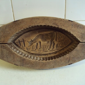 Genuine carved wooden butter dish dating from the 1950s.