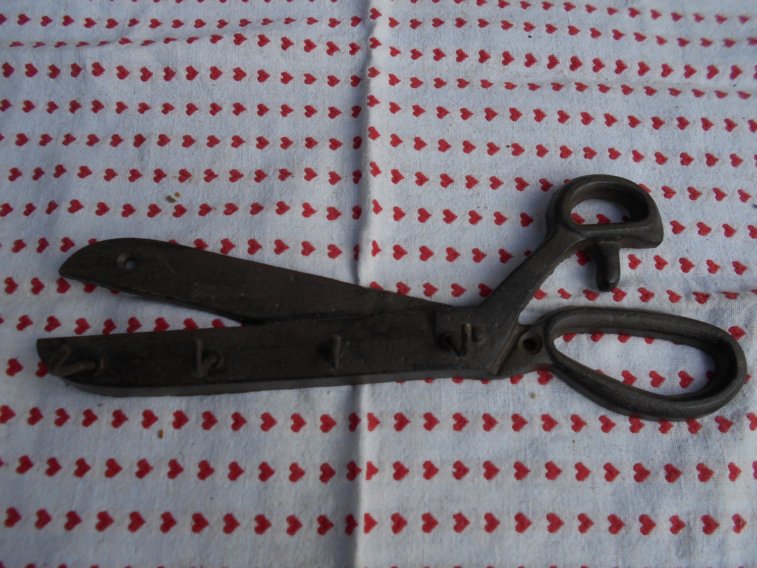 Support de Clées en Fonte Forme Ciseau.