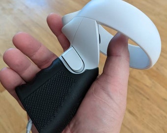 A Pair of Oculus 2 VR Headset Pistol Grips (controllers not included)