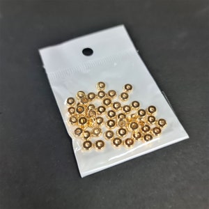 50pcs x 5mm Tarnish Resistant Gold Plated Flat Spacer Beads