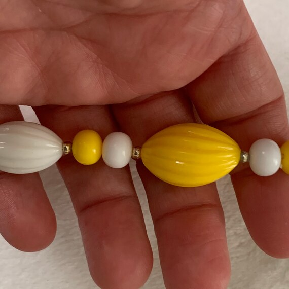 Vintage yellow and white plastic beads