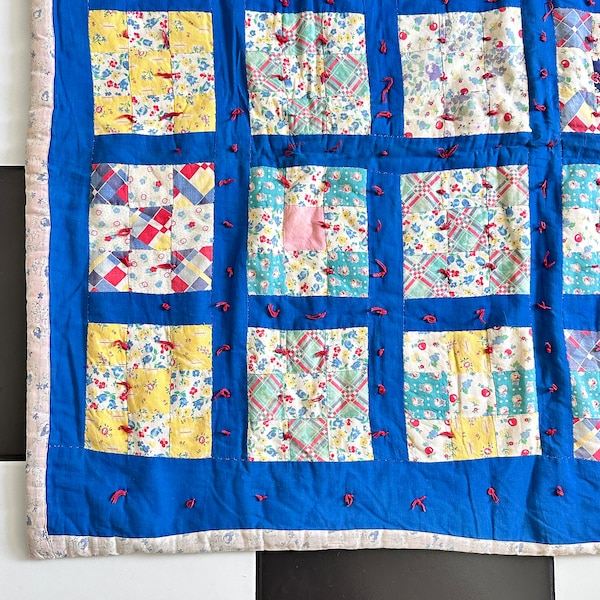 Sweet vintage antique 1940s handmade baby crib cotton quilt 34" x 43" square patchwork plaid floral blue multicolor knotted