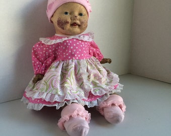 Antique Straw Stuffed and Composite Baby Doll
