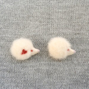 Witte egelspeld naaldvilt miniatuurdier