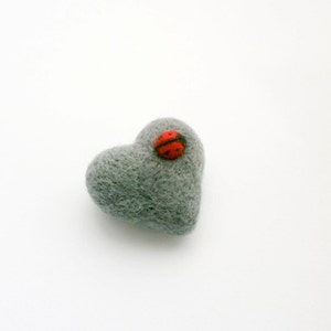 Gray heart brooch with ladybug