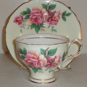 Paragon Roses and Light Yellow Cup and Saucer Fine Bone China Made in England Free Standard Shipping in the U.S.A.