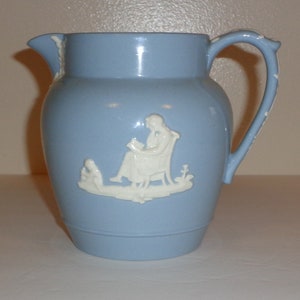 Wedgwood Embossed Queensware White on Blue Pitcher, With Angels, Made in England Free Standard Shipping in the U.S.A.
