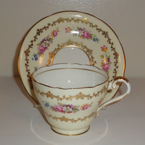 Aynsley Cream and Yellow and Gold Floral Cup and Saucer Fine Bone China, Made in England Free Standard Shipping in the U.S.A.