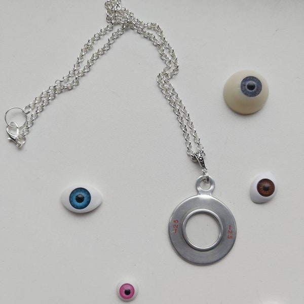 Vintage optic trial lens necklace. Numbered 2.5