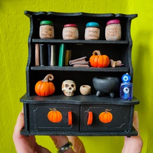 Miniature Halloween dresser with handmade items. Dolls house, pumpkins