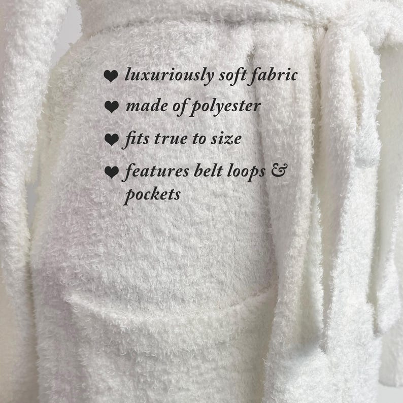 May include: A white, fluffy robe made of polyester. The robe features belt loops and pockets. Text on the image reads: "luxuriously soft fabric", "made of polyester", "fits true to size", and "features belt loops & pockets."