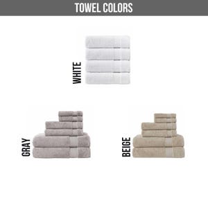 May include: Three stacks of folded towels labeled TOWEL COLORS. One stack is white, one is gray, and one is beige. Each stack contains multiple towels of varying sizes, featuring a textured fabric and a horizontal ribbed border detail.