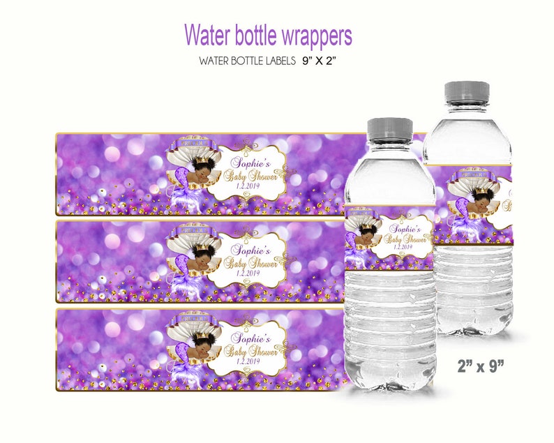 May include: Three purple and gold water bottle labels with a crown and a baby girl illustration. The labels read "Sophie's Baby Shower 1.2.2019". The labels are 9 inches by 2 inches.