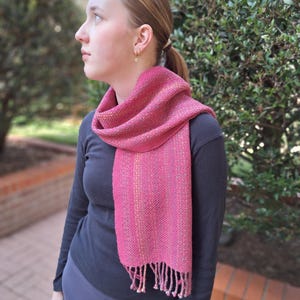 Celebration of Colors: Artisanal Hand-Woven Scarf in Vibrant Pink, Blue, Green, and Yellow