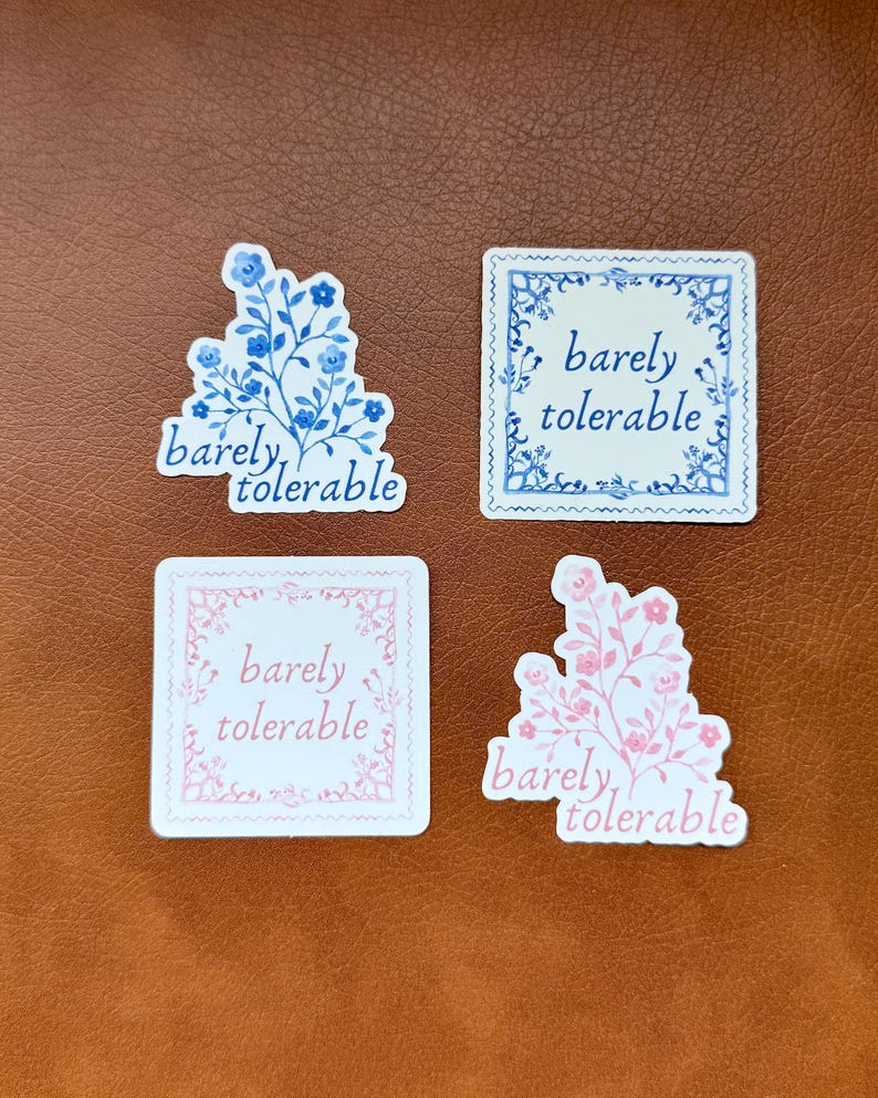 May include: Four stickers with the text "barely tolerable" in a blue and white floral design and a pink and white floral design. Two of the stickers have a square frame with a floral design.