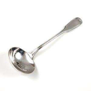 May include: A silver-colored ladle with a heart-shaped design on the handle. The ladle has a rounded bowl and a long, slender handle. The utensil is made of a shiny, reflective metal and is set against a white background.