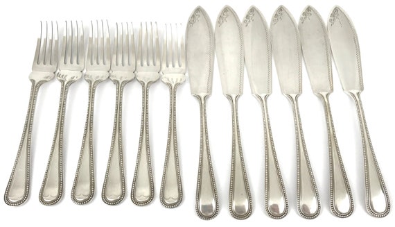 fish knives and forks antique