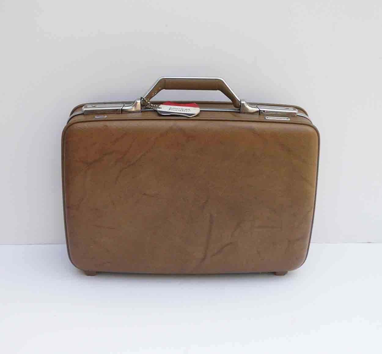 vintage american tourister luggage yellow