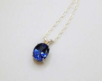 Blue Topaz Necklace. Blue Topaz in Sterling Silver Prong Setting. Facet Blue Topaz 10mm x 8mm