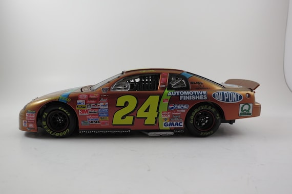 1998 Action Platinum Series 1:24 Scale Die cast Car No 24 Jeff Gordon Chromalusion Monte Carlo NIB Mint Condition In Original Box