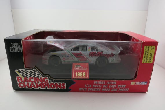 1996 Racing Champions 1:24 Scale Nascar Diecast Car No 5 Terry Labonte Gray and White Kelloggs Livery Bank On Stand New In Box