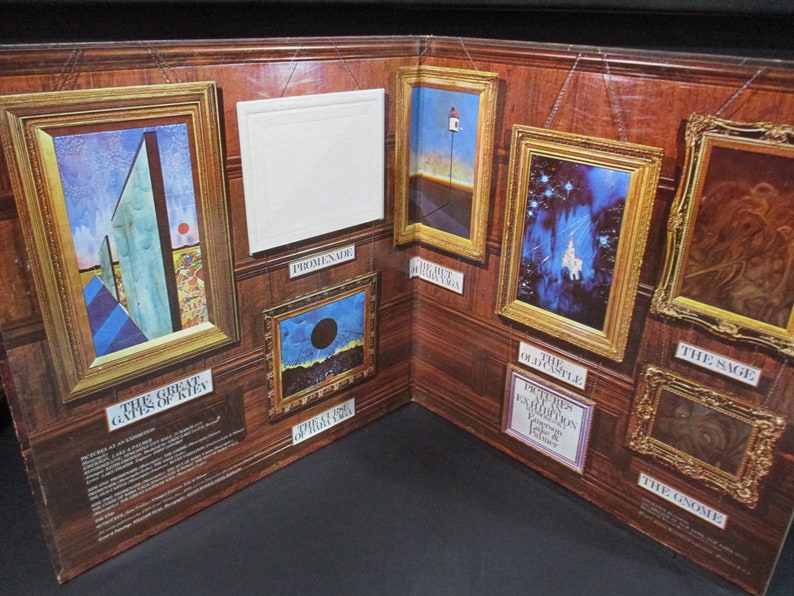 May include: A vintage vinyl record album cover featuring a series of framed paintings with titles like "The Great Gates of Kiev", "Promenade", "The Hut on Fowl Legs", "The Old Castle", "The Sage", and "The Gnome". The album is titled "Pictures at an Exhibition" by Modest Mussorgsky, performed by the London Symphony Orchestra conducted by Andre Previn.