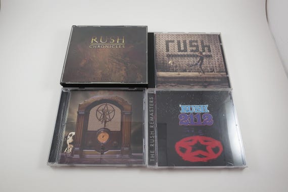 Vintage 80's/90's Rush CD's 2112 Chronicles Roll The Bones Sold Individually