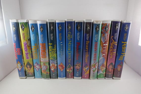 Collection of 13 Vintage Disney Black Diamond VHS Tapes Originals Aladdin Dumbo Cinderella Bambi