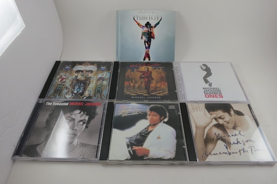 Vintage Michael Jackson CDs: Thriller, Bad, Dangerous, History